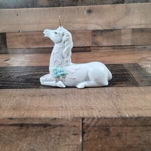 Resting Unicorn Beautifully Painted with Blue Flower